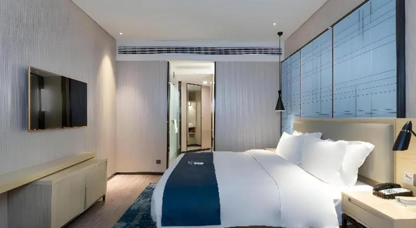 Bed in Echarm Hotel Nanning the MixC Exhibition Center Metro Station