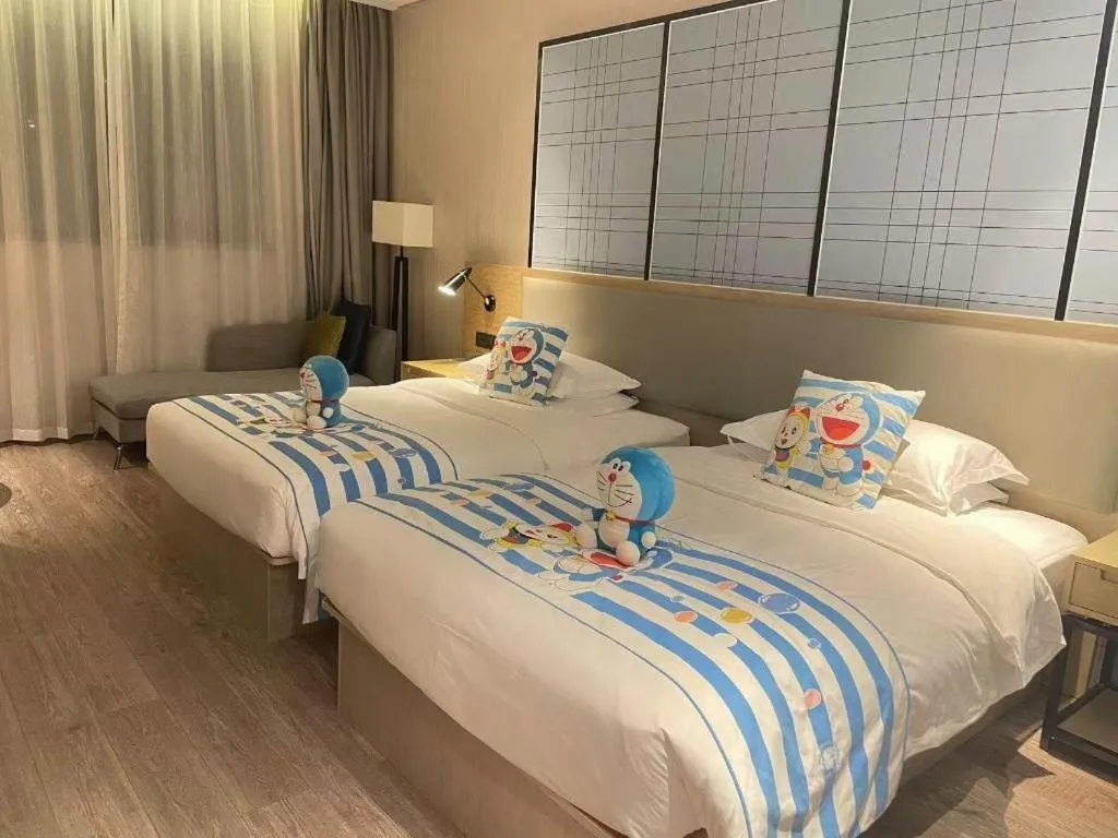 Bed in Echarm Hotel Nanning the MixC Exhibition Center Metro Station