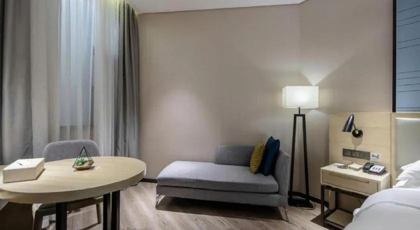 Bed in Echarm Hotel Nanning the MixC Exhibition Center Metro Station