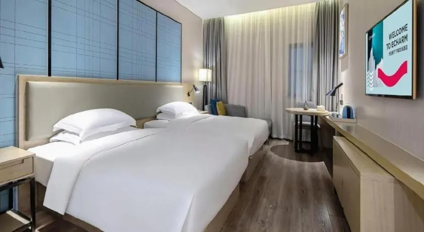 Bed in Echarm Hotel Nanning the MixC Exhibition Center Metro Station