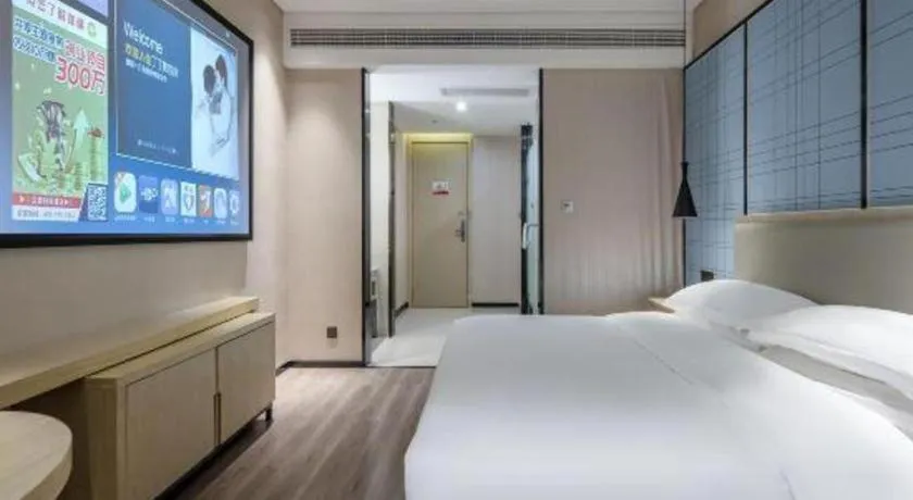 Bed in Echarm Hotel Nanning the MixC Exhibition Center Metro Station