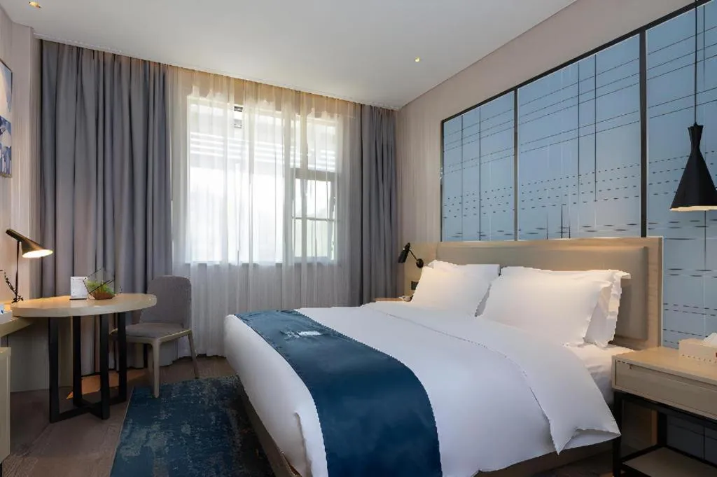 Bed in Echarm Hotel Nanning the MixC Exhibition Center Metro Station