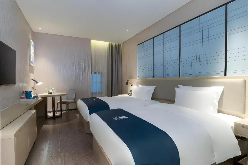 Bed in Echarm Hotel Nanning the MixC Exhibition Center Metro Station
