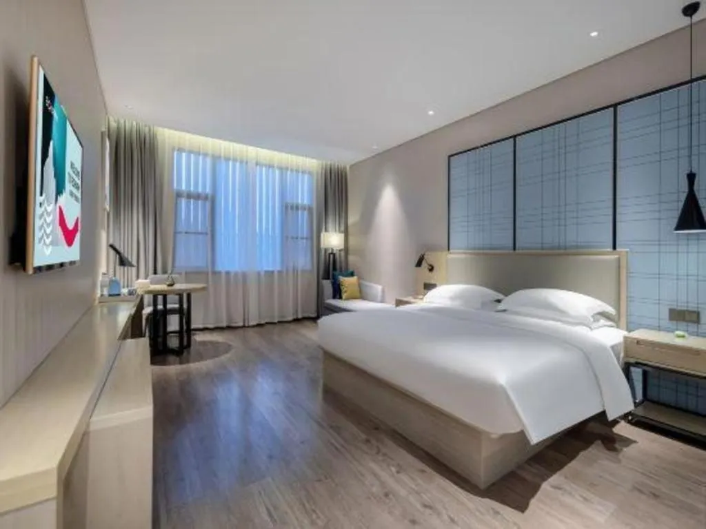 Bed in Echarm Hotel Nanning the MixC Exhibition Center Metro Station