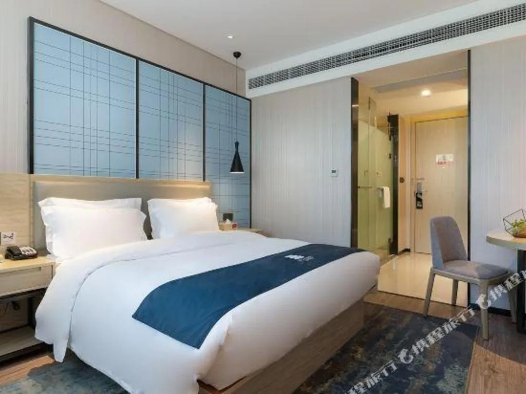 Bed in Echarm Hotel Nanning the MixC Exhibition Center Metro Station