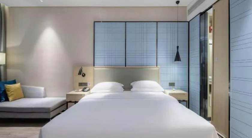 Bed in Echarm Hotel Nanning the MixC Exhibition Center Metro Station