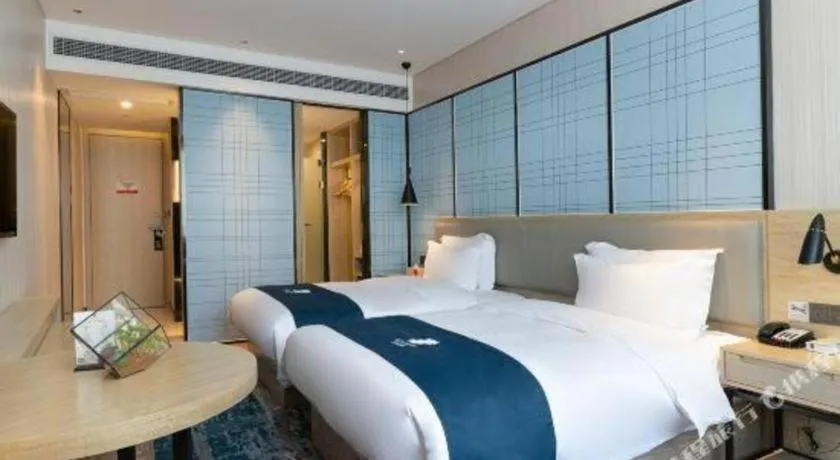 Bed in Echarm Hotel Nanning the MixC Exhibition Center Metro Station