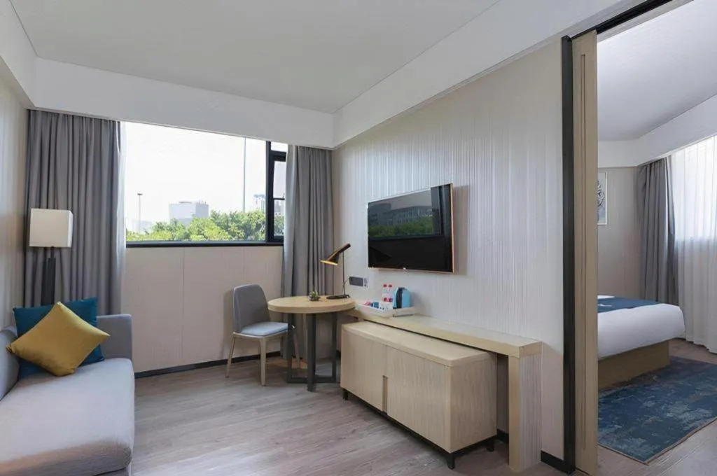 Bed in Echarm Hotel Nanning the MixC Exhibition Center Metro Station