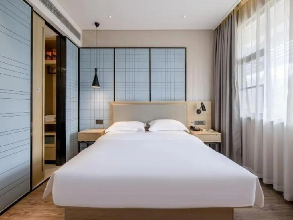 Bed in Echarm Hotel Nanning the MixC Exhibition Center Metro Station