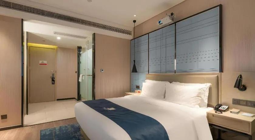 Bed in Echarm Hotel Nanning the MixC Exhibition Center Metro Station
