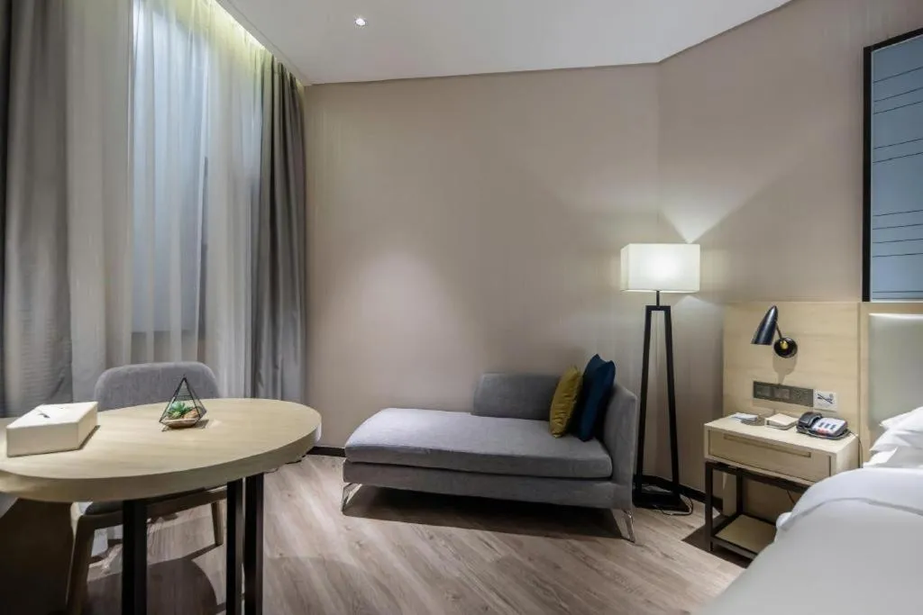 Bed in Echarm Hotel Nanning the MixC Exhibition Center Metro Station