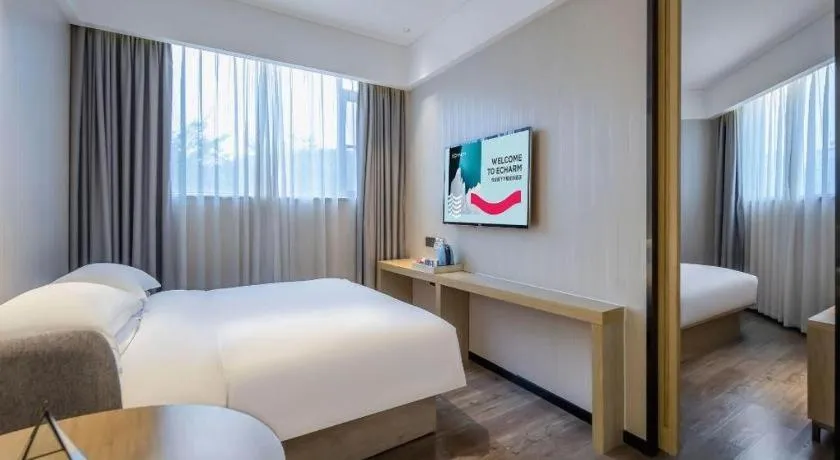 Bed in Echarm Hotel Nanning the MixC Exhibition Center Metro Station