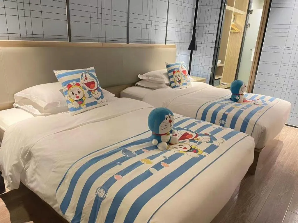 Bed in Echarm Hotel Nanning the MixC Exhibition Center Metro Station
