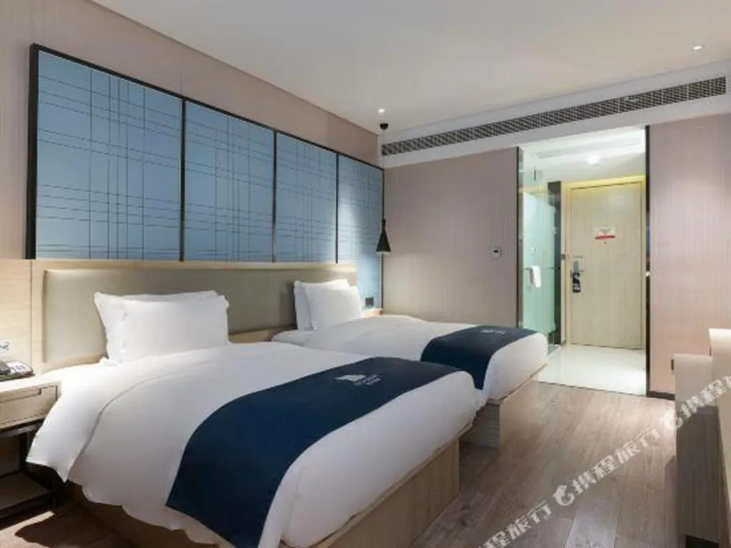 Bed in Echarm Hotel Nanning the MixC Exhibition Center Metro Station