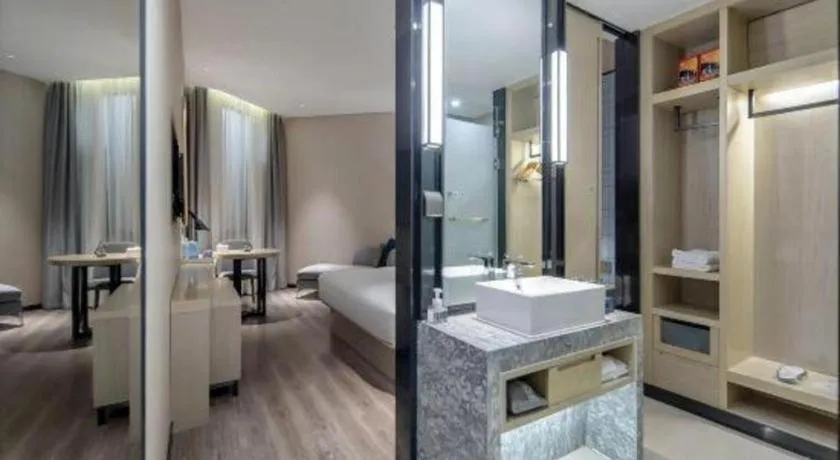 Bed in Echarm Hotel Nanning the MixC Exhibition Center Metro Station