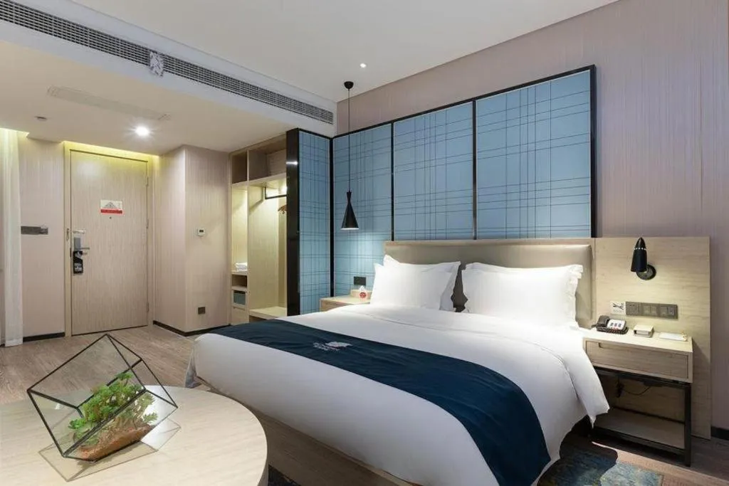 Bed in Echarm Hotel Nanning the MixC Exhibition Center Metro Station