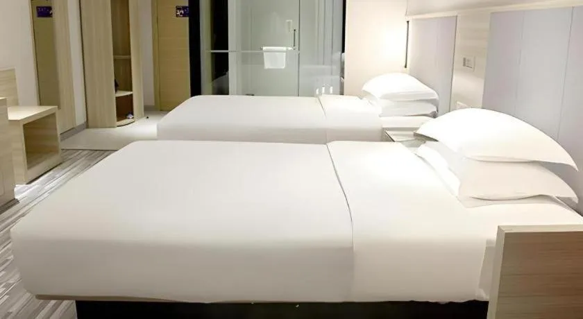 Bed in JTOUR Inn Yizhou Hechi College Pedestrian Street
