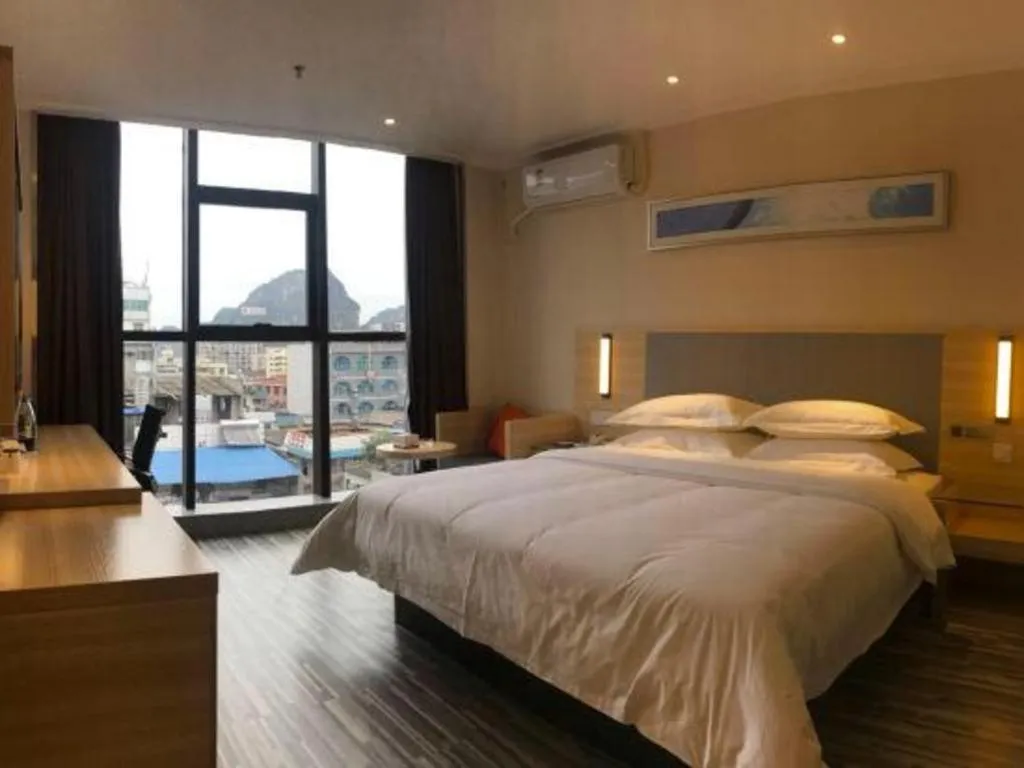 Bed in JTOUR Inn Yizhou Hechi College Pedestrian Street