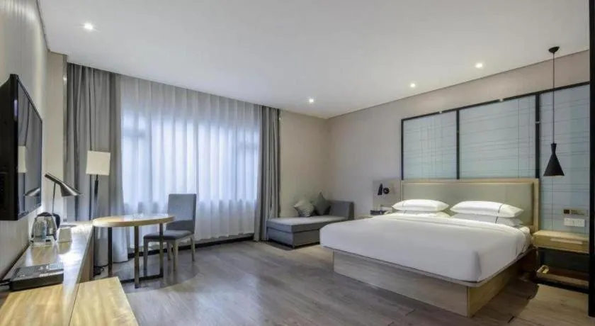 Bed in JTOUR Inn Yizhou Hechi College Pedestrian Street