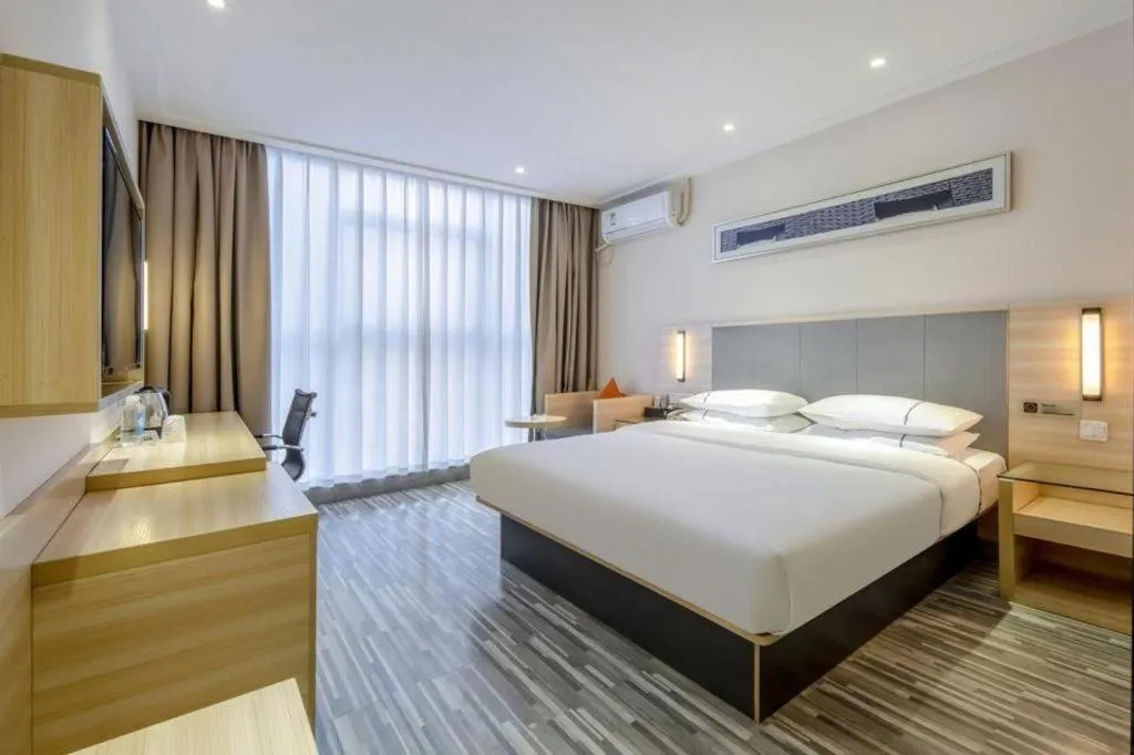 Bed in JTOUR Inn Yizhou Hechi College Pedestrian Street