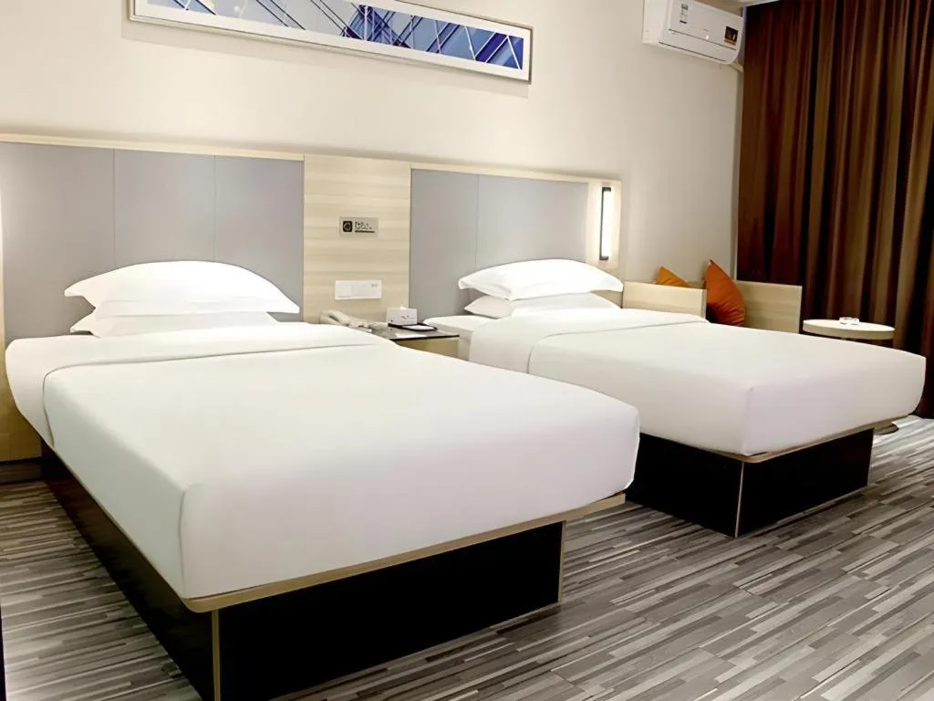 Bed in JTOUR Inn Yizhou Hechi College Pedestrian Street