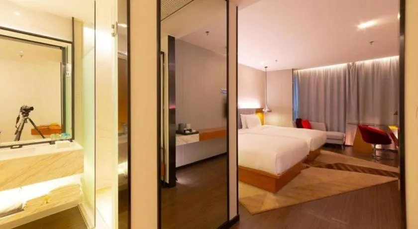 Bed in Borrman Hotel Zhanjiang Xuwen Port Terminal