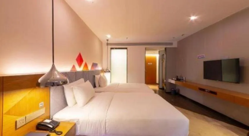Bed in Borrman Hotel Zhanjiang Xuwen Port Terminal