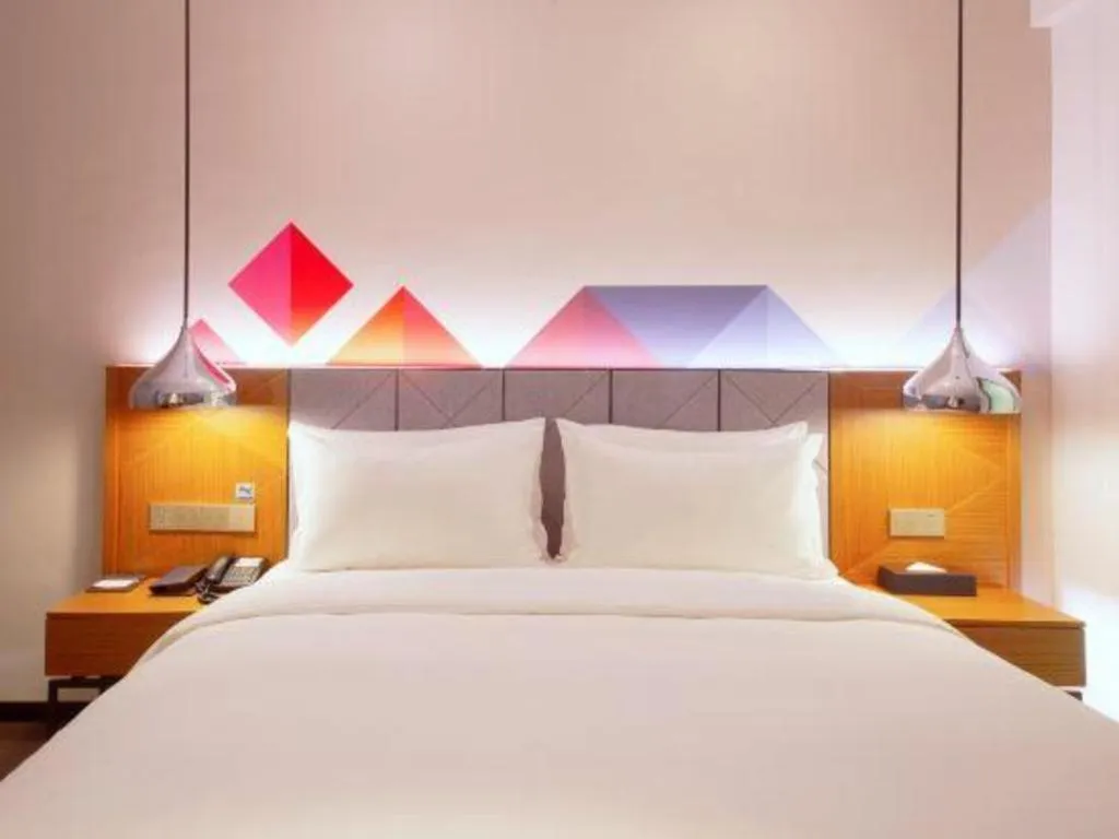 Bed in Borrman Hotel Zhanjiang Xuwen Port Terminal