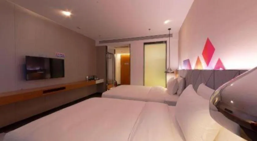 Bed in Borrman Hotel Zhanjiang Xuwen Port Terminal