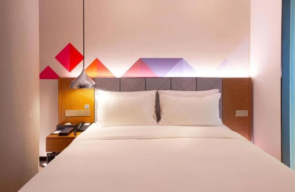 Bed in Borrman Hotel Zhanjiang Xuwen Port Terminal