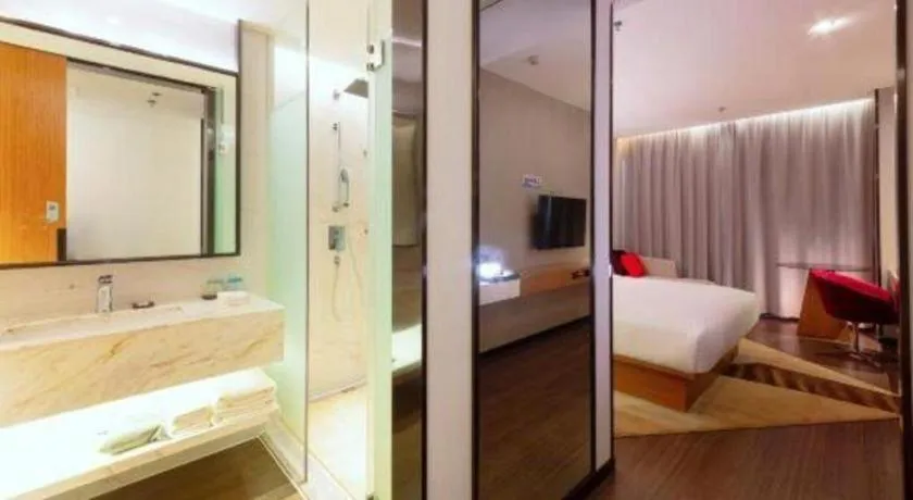 Bed in Borrman Hotel Zhanjiang Xuwen Port Terminal