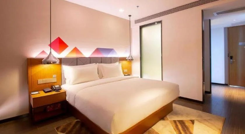 Bed in Borrman Hotel Zhanjiang Xuwen Port Terminal