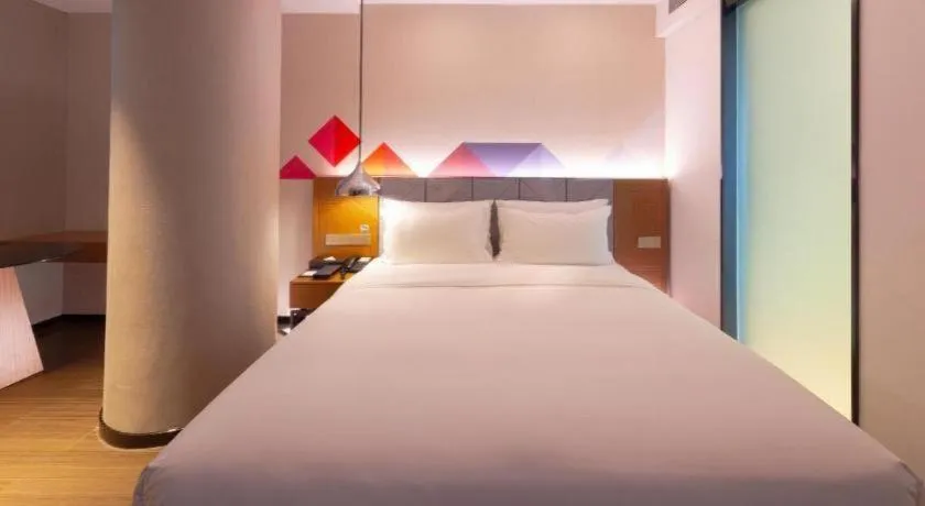 Bed in Borrman Hotel Zhanjiang Xuwen Port Terminal