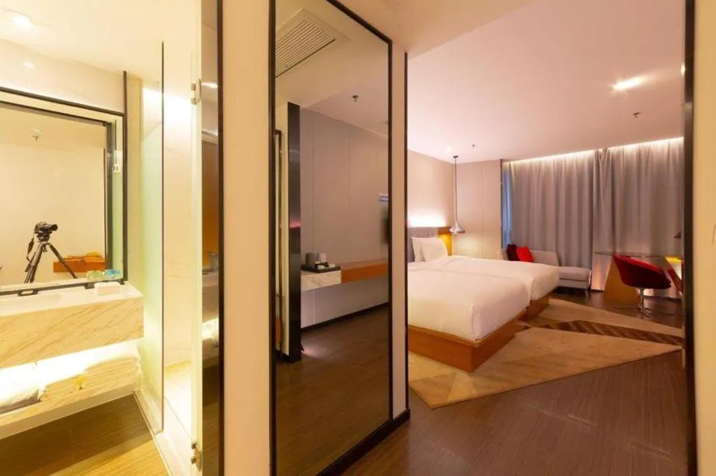 Bed in Borrman Hotel Zhanjiang Xuwen Port Terminal