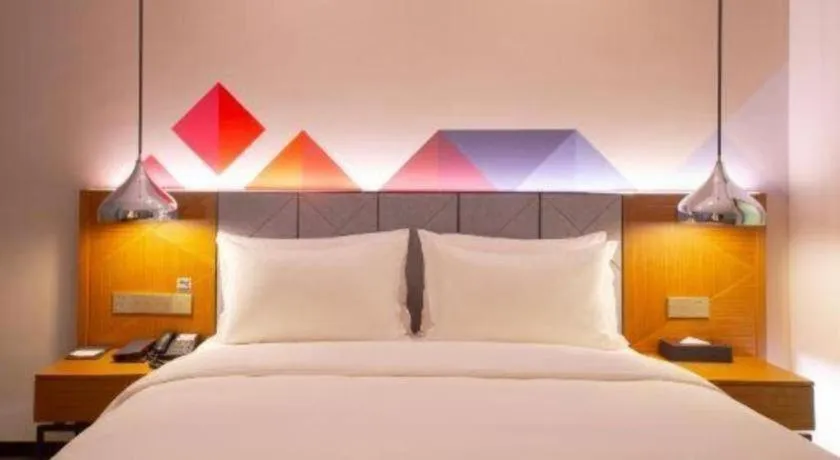 Bed in Borrman Hotel Zhanjiang Xuwen Port Terminal