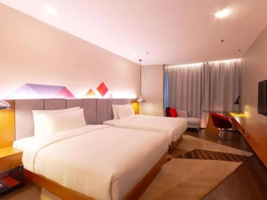 Bed in Borrman Hotel Zhanjiang Xuwen Port Terminal