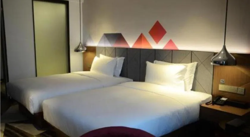 Bed in Borrman Hotel Zhanjiang Xuwen Port Terminal