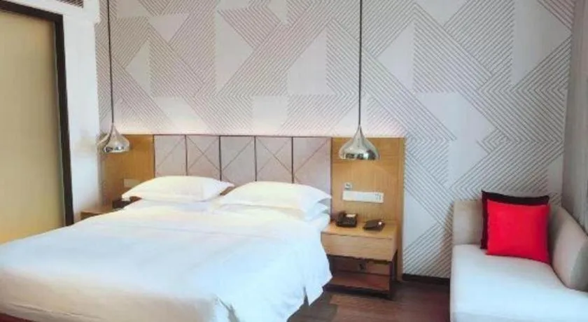 Bed in Borrman Hotel Zhanjiang Xuwen Port Terminal