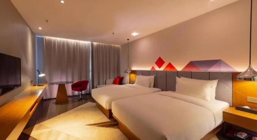 Bed in Borrman Hotel Zhanjiang Xuwen Port Terminal