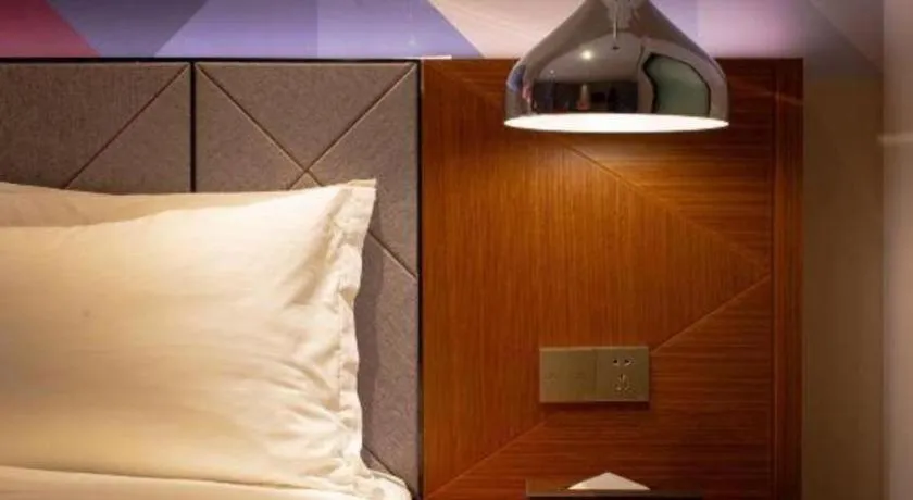 Bed in Borrman Hotel Zhanjiang Xuwen Port Terminal