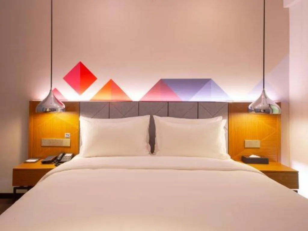 Bed in Borrman Hotel Zhanjiang Xuwen Port Terminal