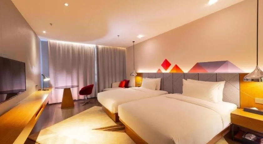 Bed in Borrman Hotel Zhanjiang Xuwen Port Terminal