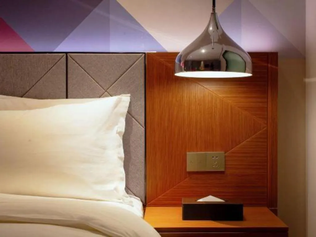 Bed in Borrman Hotel Zhanjiang Xuwen Port Terminal