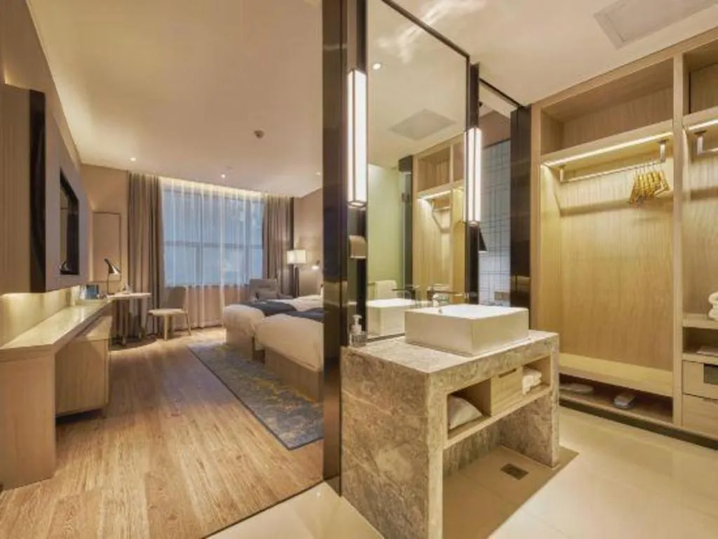 Bed in Echarm Hotel Liuzhou High-speed Railway Station