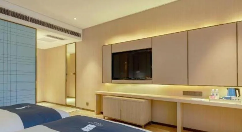 Bed in Echarm Hotel Liuzhou High-speed Railway Station