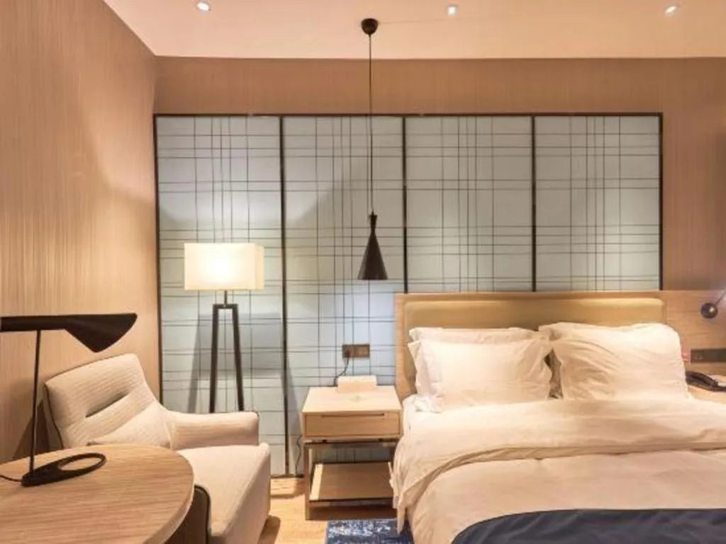 Bed in Echarm Hotel Liuzhou High-speed Railway Station