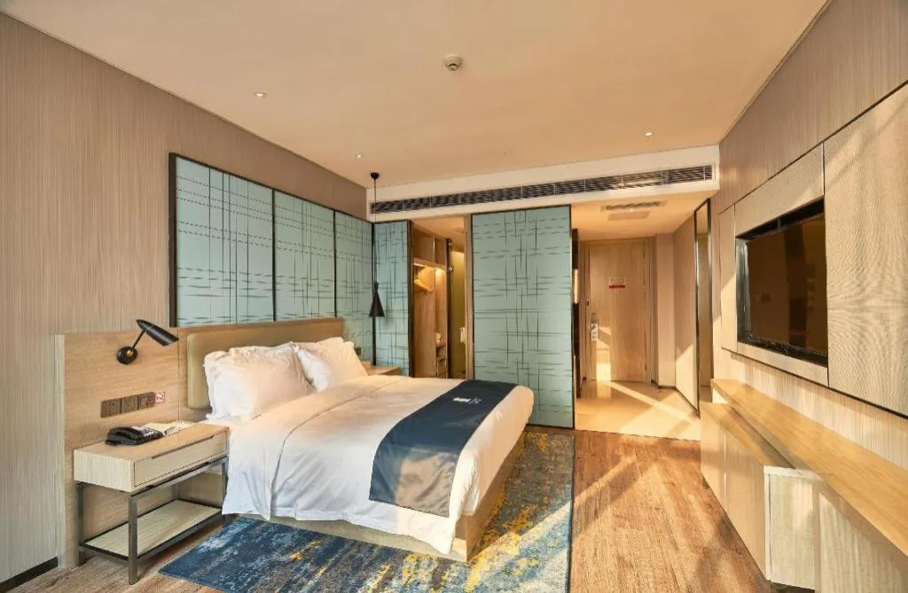 Bed in Echarm Hotel Liuzhou High-speed Railway Station