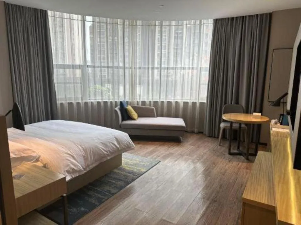 Bed in Echarm Hotel Liuzhou High-speed Railway Station