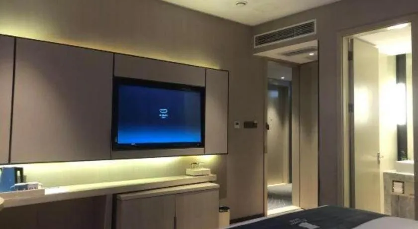 Bed in Echarm Hotel Liuzhou High-speed Railway Station