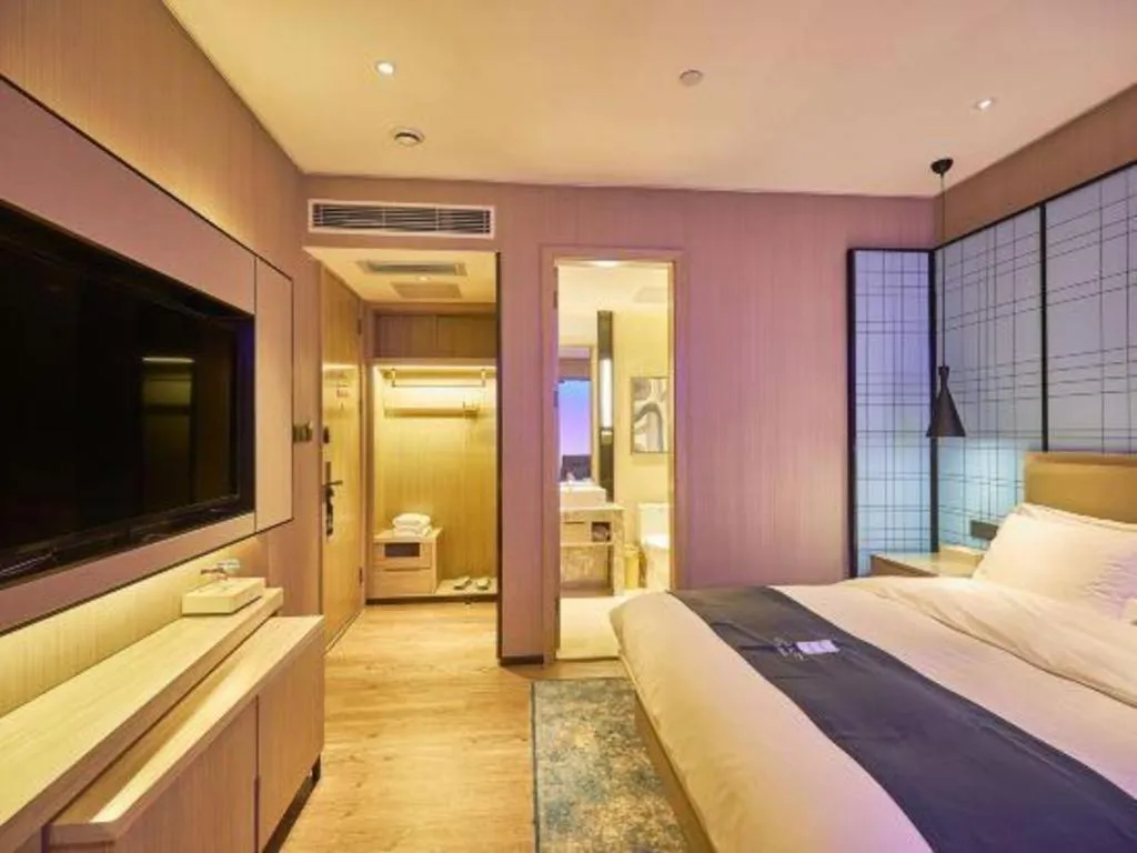 Bed in Echarm Hotel Liuzhou High-speed Railway Station